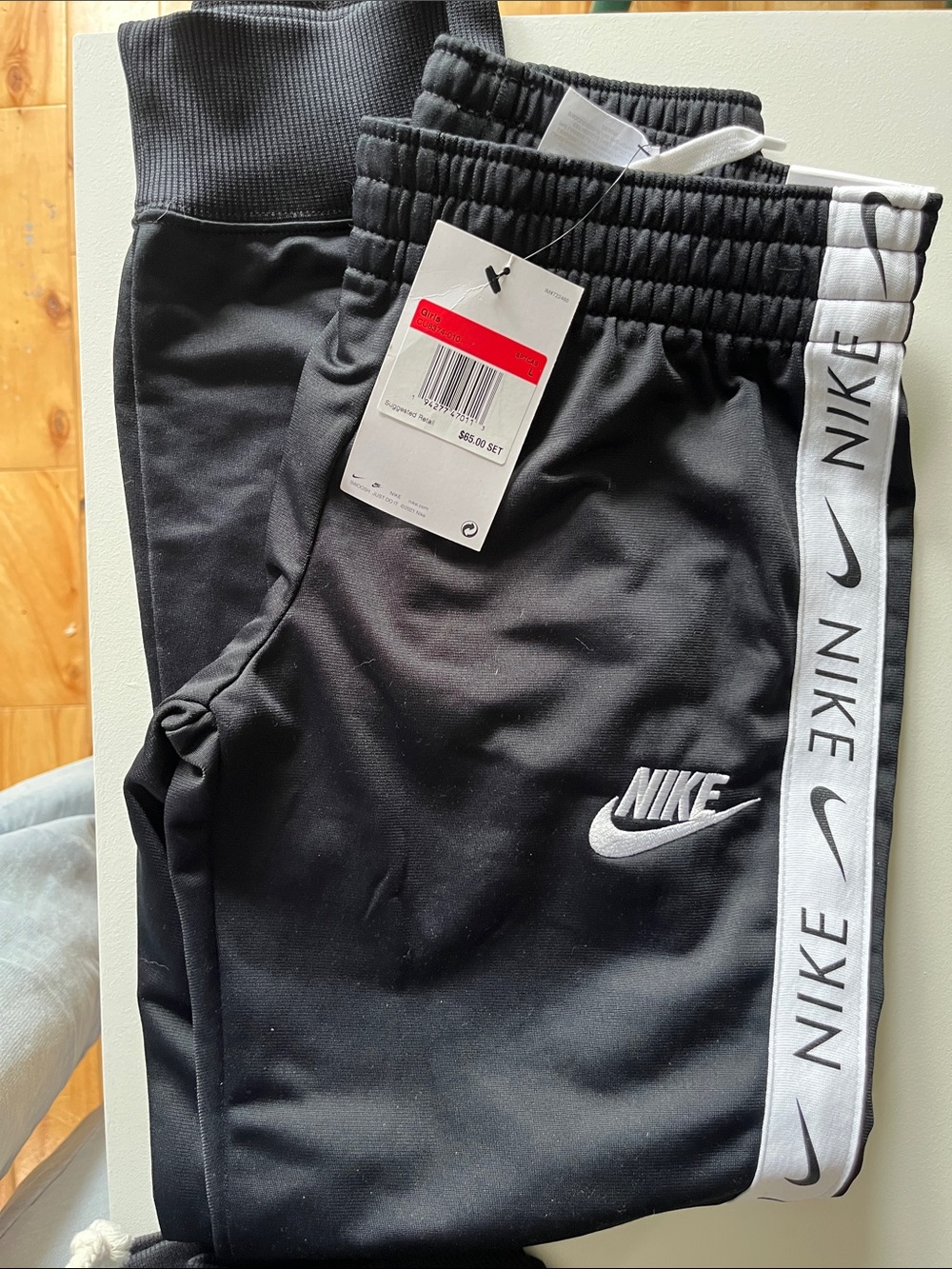 Nike Black Joggers with White Logo Tape